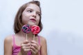 Beautiful cute little girl eating lollipop Royalty Free Stock Photo