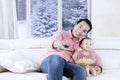 Child eats popcorn and watching tv Royalty Free Stock Photo