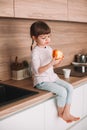 Cute little girl eating red apple Royalty Free Stock Photo