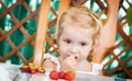 Cute little girl eating Royalty Free Stock Photo