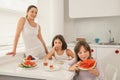 Cute little girl eating tasty watermelon Royalty Free Stock Photo