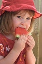 Girl eating melon Royalty Free Stock Photo