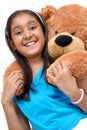 Cute little girl embracing teddy bear Royalty Free Stock Photo