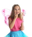 Cute little girl in fairy costume with pink wings and magic wand on white background Royalty Free Stock Photo