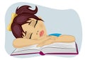 Cute little girl fallen asleep on her book Royalty Free Stock Photo