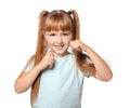 Cute little girl flossing her teeth on white background Royalty Free Stock Photo