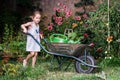Cute little girl gardening in the backyard Royalty Free Stock Photo