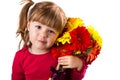 Cute little girl with gerbera flowers bouquet