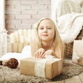 Cute little girl with gift Royalty Free Stock Photo