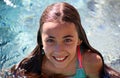 Little girl green eyes children playing at pool at tropical resort in Los Cabos Mexico Royalty Free Stock Photo