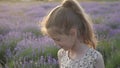 Cute little girl happily plays in Provence. merriment and smiles feeling good summertime nature of France concept of travel