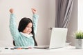 A cute little girl is happy to learn computer.