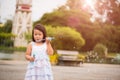 Cute little girl having fun with blowing soap bubbles Royalty Free Stock Photo