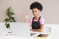 Cute little girl having meeting online. Kid using laptop at home. Royalty Free Stock Photo