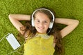 Cute little girl with headphones Royalty Free Stock Photo