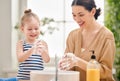 Girl and her mother are washing hands Royalty Free Stock Photo