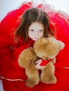 Cute little girl with her teddy-bear toy friend Royalty Free Stock Photo