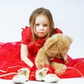 Cute little girl with her teddy-bear toy friend Royalty Free Stock Photo