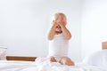 Cute little girl hiding with hands covering face Royalty Free Stock Photo