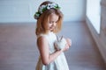 Cute little girl holding a bunny. Spring and easter portrait of beautiful child with rabbit. Royalty Free Stock Photo