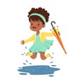 Cute little girl holding colorful umbrella and playing in the rain cartoon vector Illustration Royalty Free Stock Photo