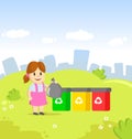 Cute little girl holding garbage plastic bag standing near containers with different types of recycling waste. Segregate Royalty Free Stock Photo