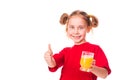 Cute little girl holding glass with juice smiling Royalty Free Stock Photo