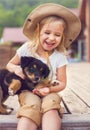 Cute little girl hugging dog puppy Royalty Free Stock Photo