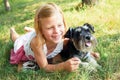 cute little girl hugging her little dog Royalty Free Stock Photo