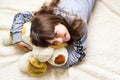 Cute little girl hugging her toy Royalty Free Stock Photo