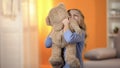 Cute little girl hugging teddy bear, favorite toy, happy childhood, best present Royalty Free Stock Photo