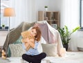 Cute little girl hugging teddy bear at home Royalty Free Stock Photo