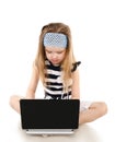 Cute little girl with laptop Royalty Free Stock Photo