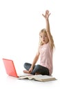 Cute little girl with laptop, raising her hand Royalty Free Stock Photo