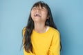 cute little girl laugh happy on blue Royalty Free Stock Photo