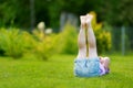 Cute little girl laying in the grass Royalty Free Stock Photo