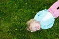 Cute little girl laying in the grass Royalty Free Stock Photo