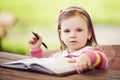 Cute little girl learning to write Royalty Free Stock Photo