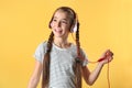 Cute little girl listening to music with headphones Royalty Free Stock Photo