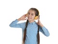 Cute little girl listening to music with headphones on white Royalty Free Stock Photo