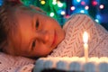Cute little girl looking at cake Royalty Free Stock Photo