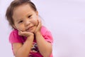 A cute little girl looking into the camera, smiling. Copy-space Royalty Free Stock Photo