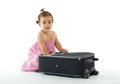 Cute little girl with luggage Royalty Free Stock Photo