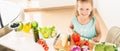 Cute little girl making salad. Child cooking. Healthy food Royalty Free Stock Photo