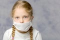 Little girl in a medical mask. Disease concept, covid-19.