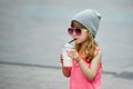 Cute little girl with milk coctail