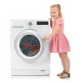 Cute little girl near washing machine with laundry Royalty Free Stock Photo
