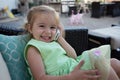 Cute Little Girl on the Phone Royalty Free Stock Photo