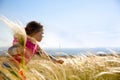Cute little girl picking grasses Royalty Free Stock Photo