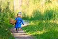 Cute little girl picking mushrooms in summer Royalty Free Stock Photo